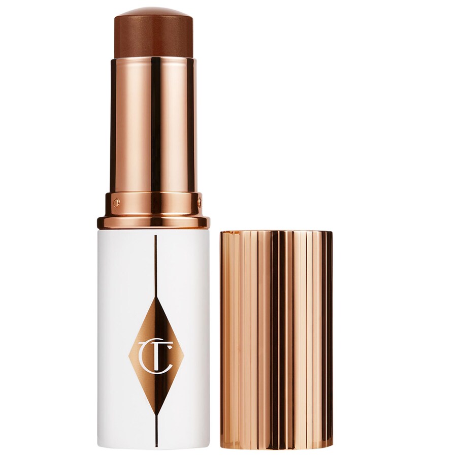 

Увлажняющий тональный крем-стик Unreal Skin Sheer Glow Tint Charlotte Tilbury, 0.3 oz /9 g, 15 Deep