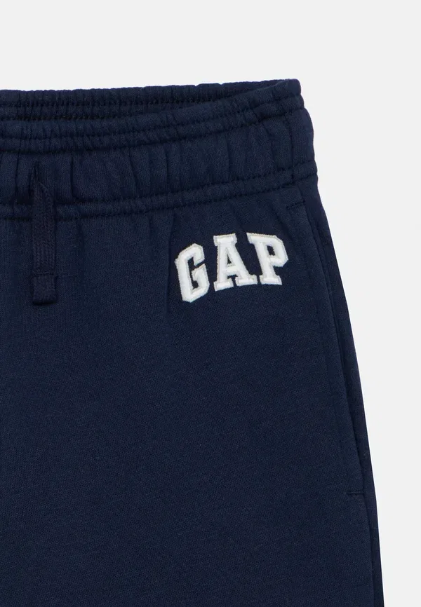 Детские спортивные штаны Gap, модель Kids relaxed logo joggers, цвет гобеленовый синий — фото 3