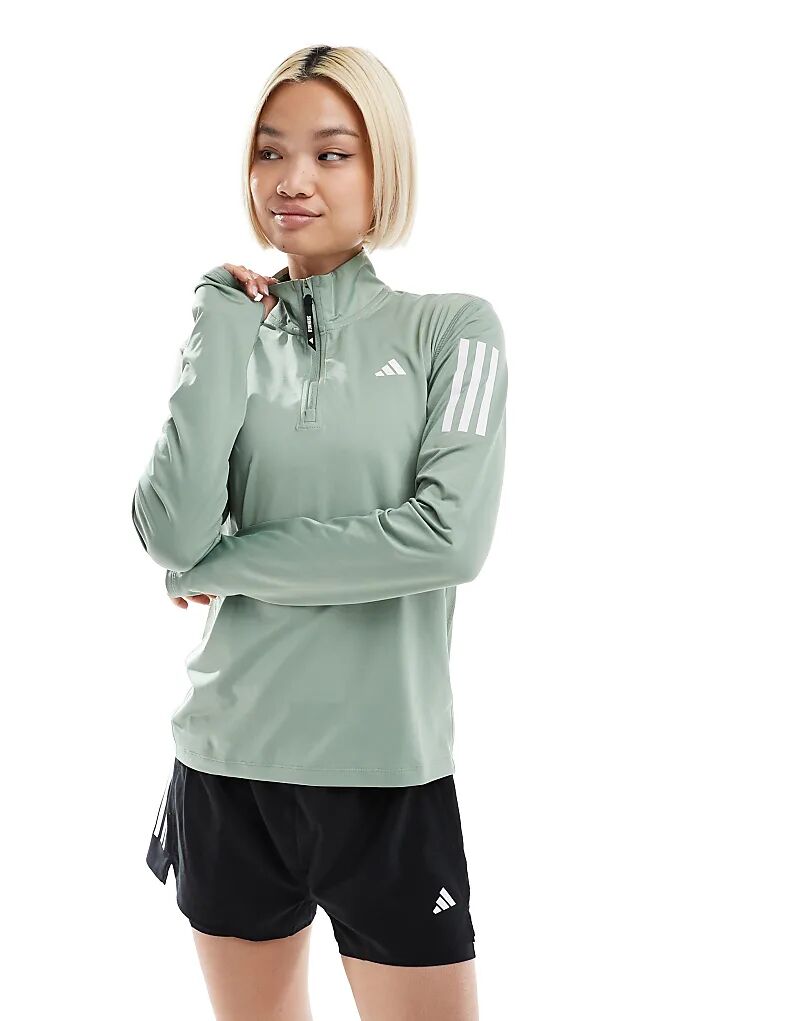 

Топ adidas Running Own The Run с застежкой-молнией 1/4 серебристо-зеленого цвета adidas performance