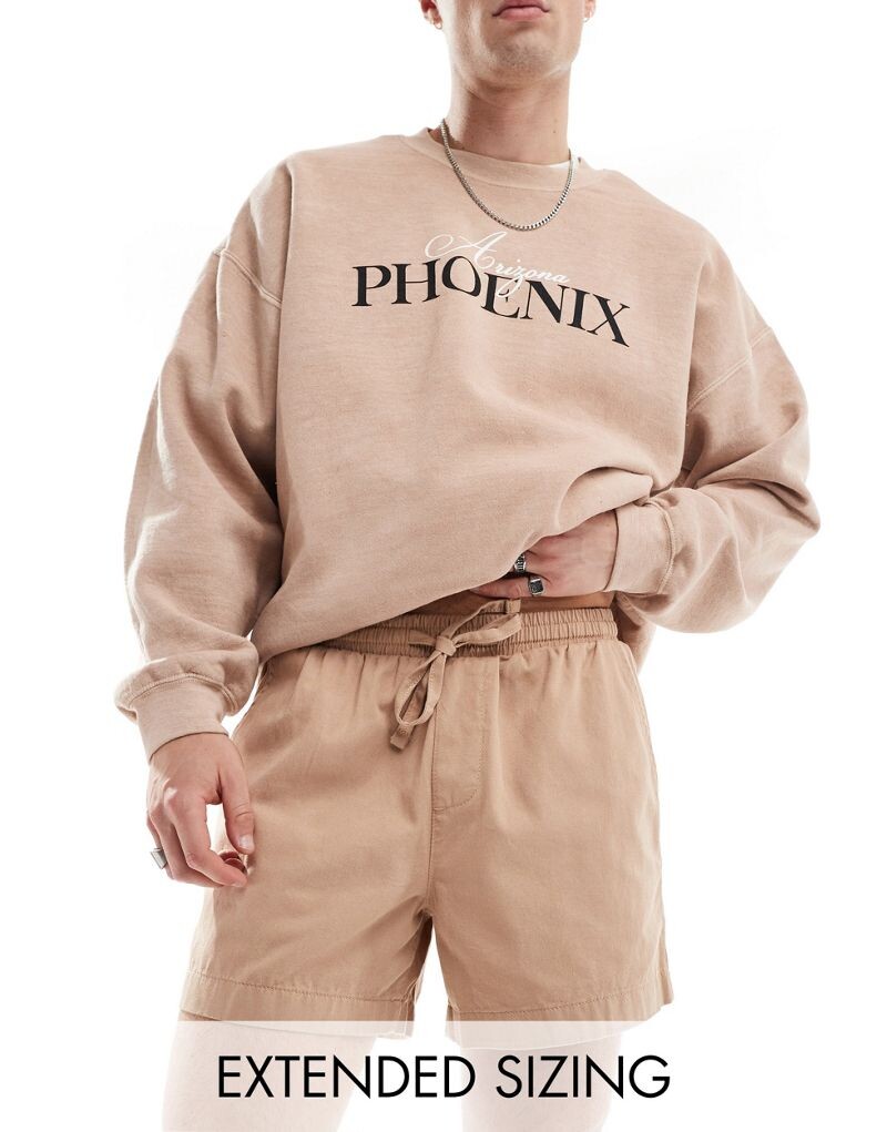 

Бежевые широкие шорты-чиносы укороченной длины с резинкой на талии ASOS DESIGN