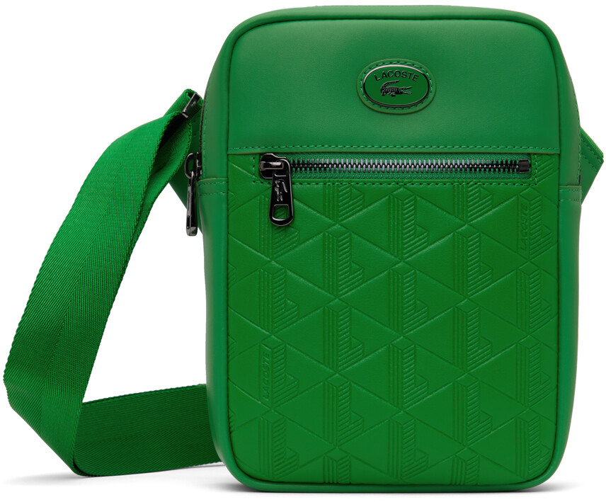 

Вертикальная кожаная сумка с монограммой Lacoste