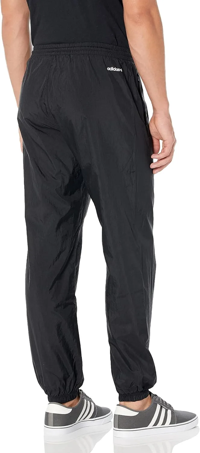 Мужские спортивные брюки Adidas Originals Shattered Trefoil Woven Track Pant — фото 2