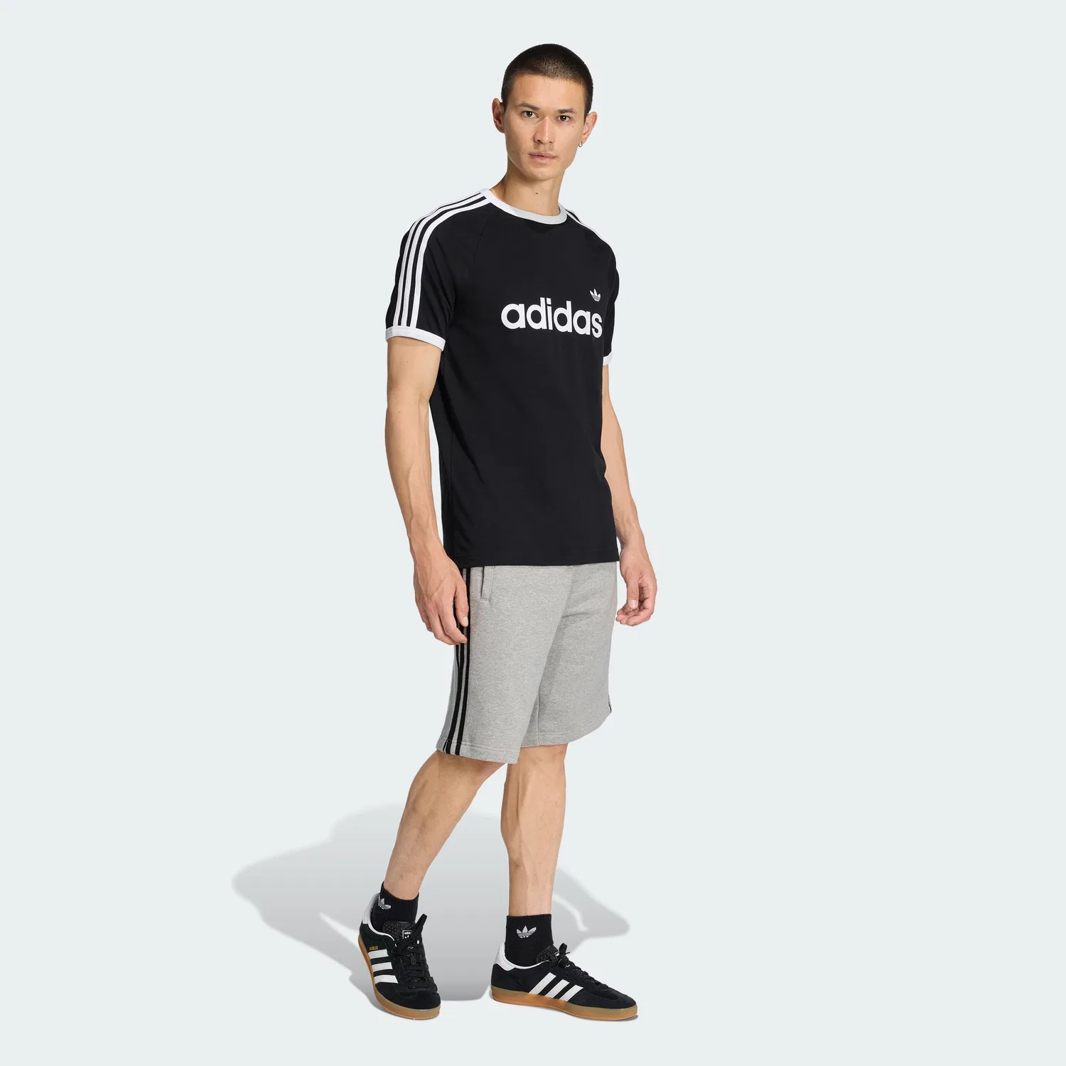 Мужская чёрная футболка с тремя полосками Slim Ringer от Adidas — фото 3