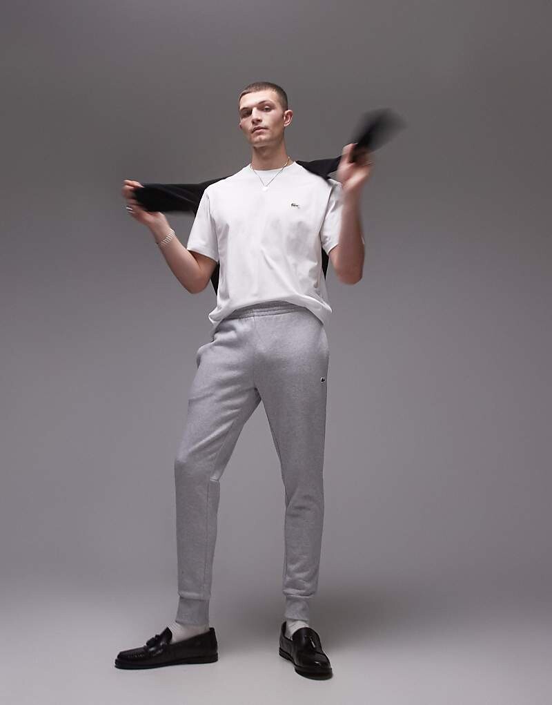 

Lacoste – серые спортивные штаны узкого кроя с логотипом