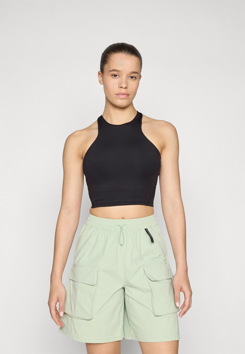 

Спортивный бюстгальтер с легкой поддержкой REFINA LONGLINE BRA The North Face, черный