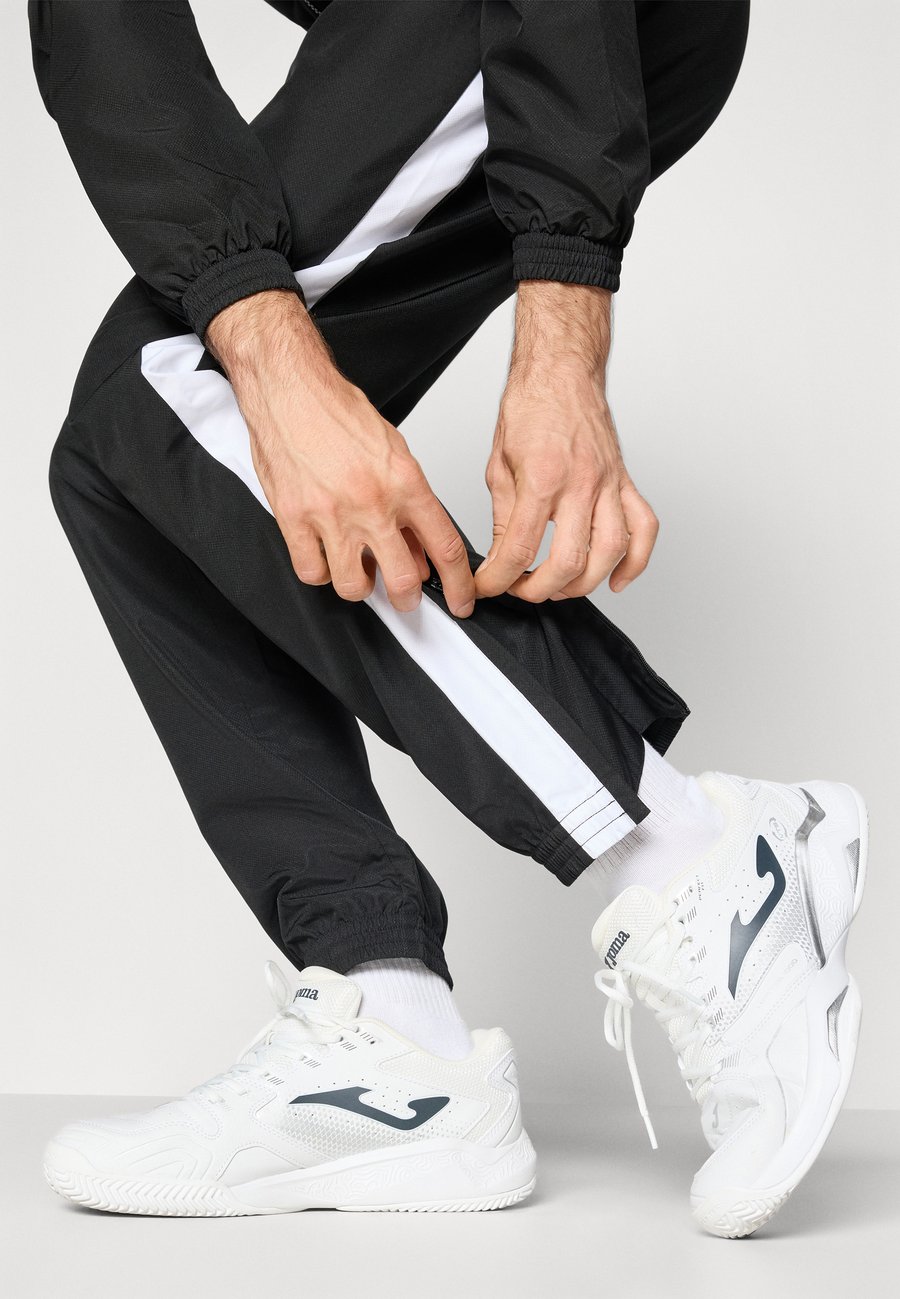 Спортивный костюм Lacoste Sport TENNIS TRACKSUIT SET, Black/France Blue/White/Black — фото 4