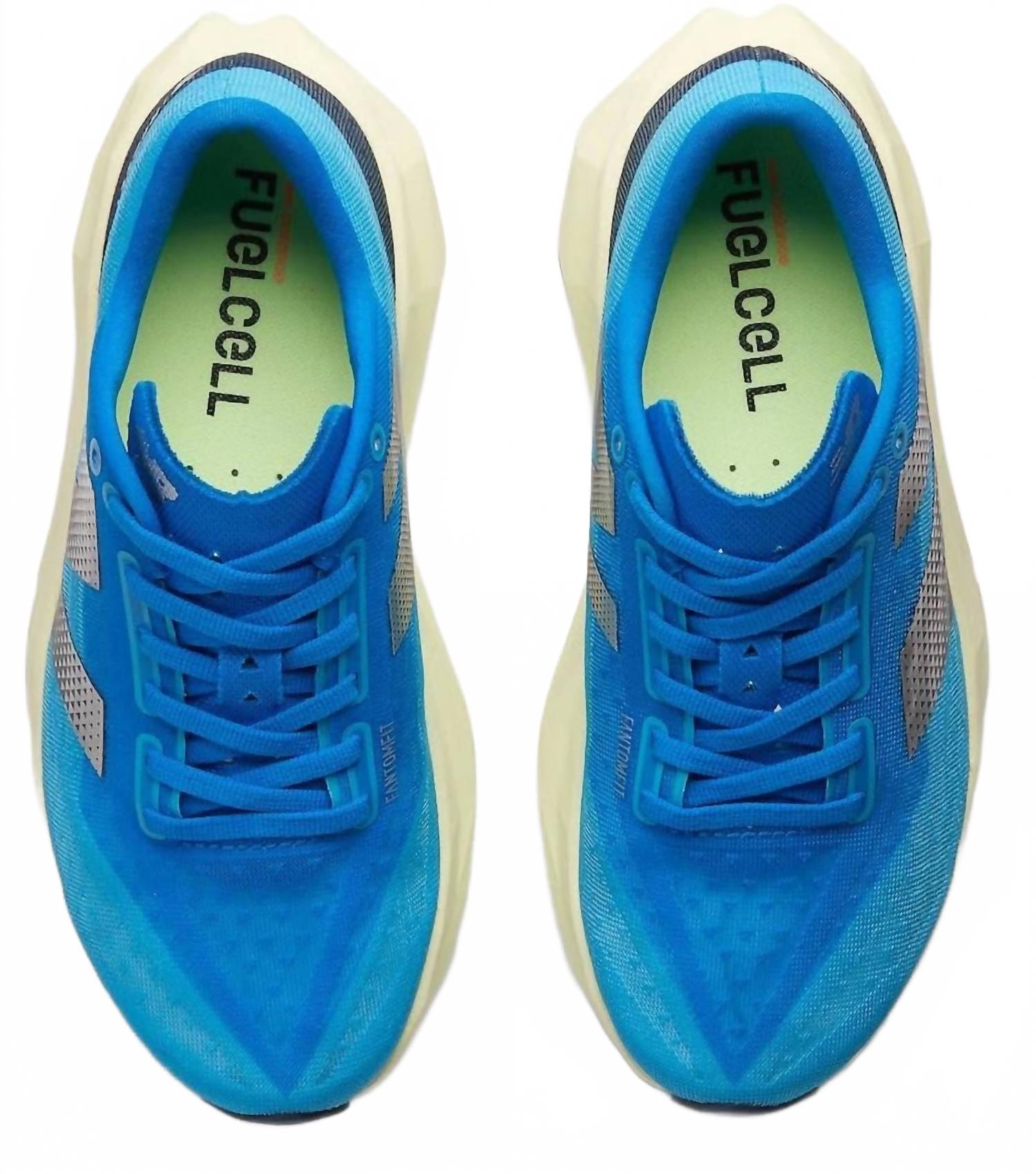 Женские беговые кроссовки Fuelcell Rebel V4 в цвете Spice Blue/limelight/blue Oasis New Balance — фото 3