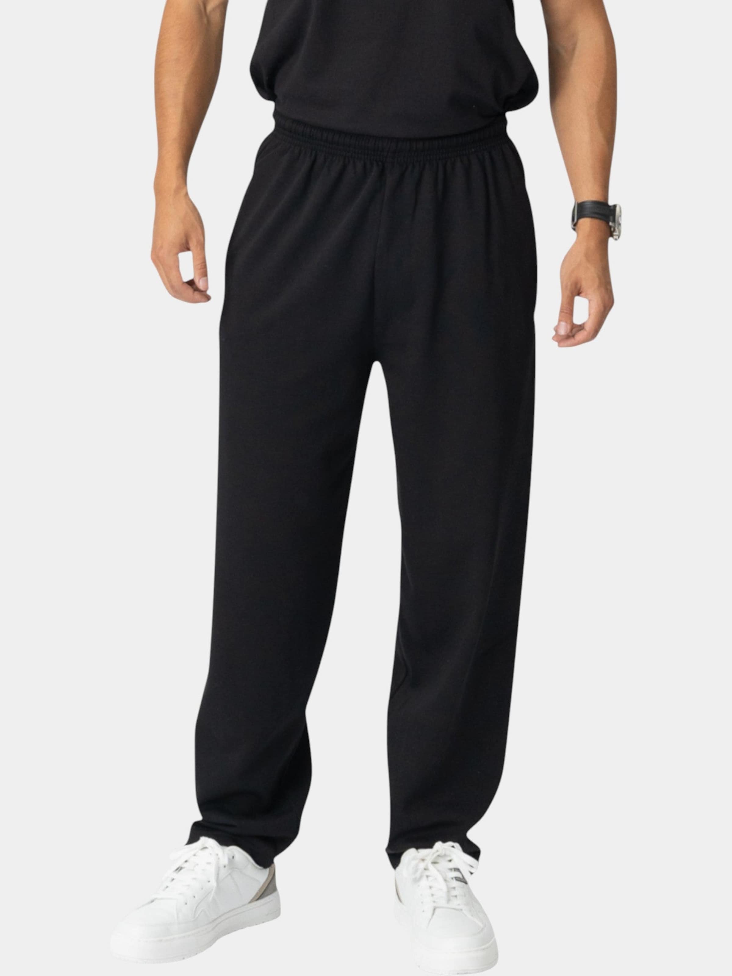 

TEESHOPPEN Брюки с зауженным низом в черном цвете