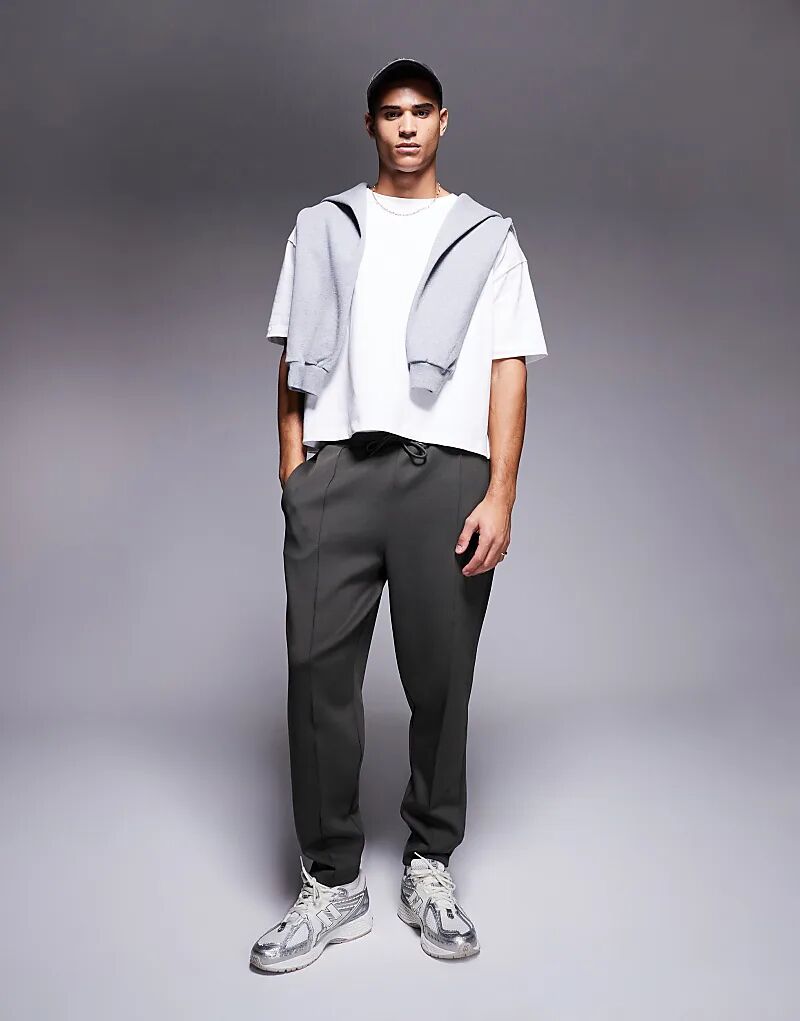 

Зауженные книзу спортивные штаны цвета хаки ASOS DESIGN