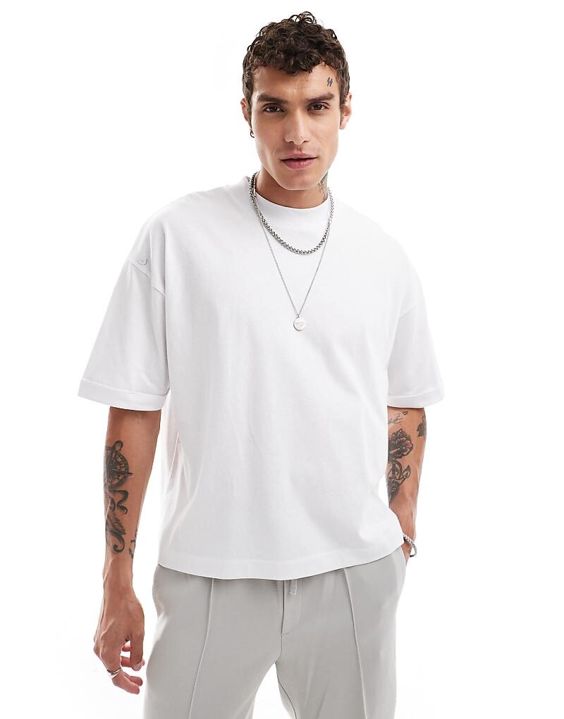

Белая объемная футболка свободного кроя с высоким воротником ASOS DESIGN