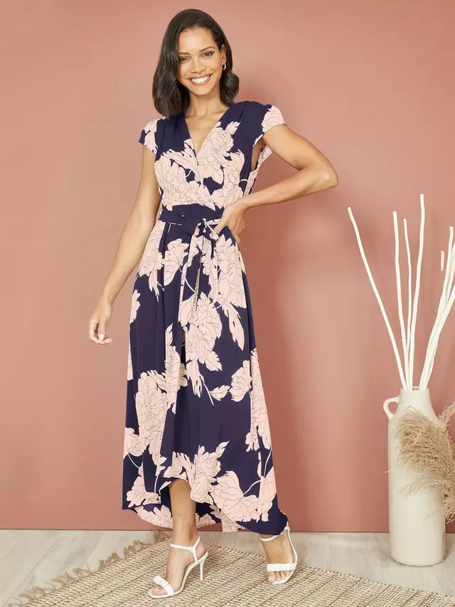 

Платье Yumi Mela London Blossom Print Midi Dipped Hem Wrap, цвет navy/multi