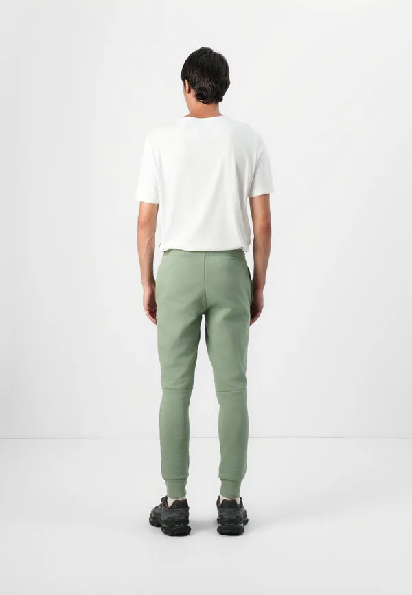 Спортивные штаны унисекс Lacoste, Thyme — фото 3