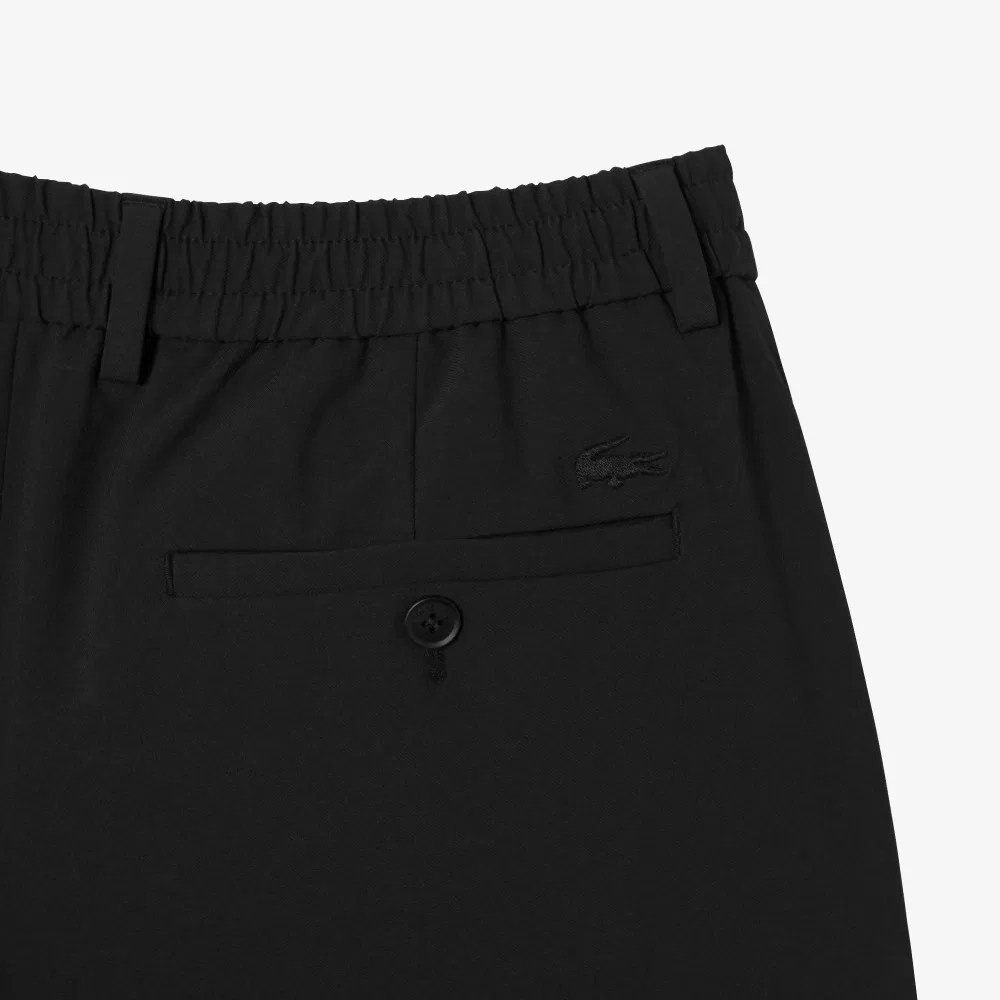 Мужские лёгкие брюки чёрного цвета от Lacoste — фото 4