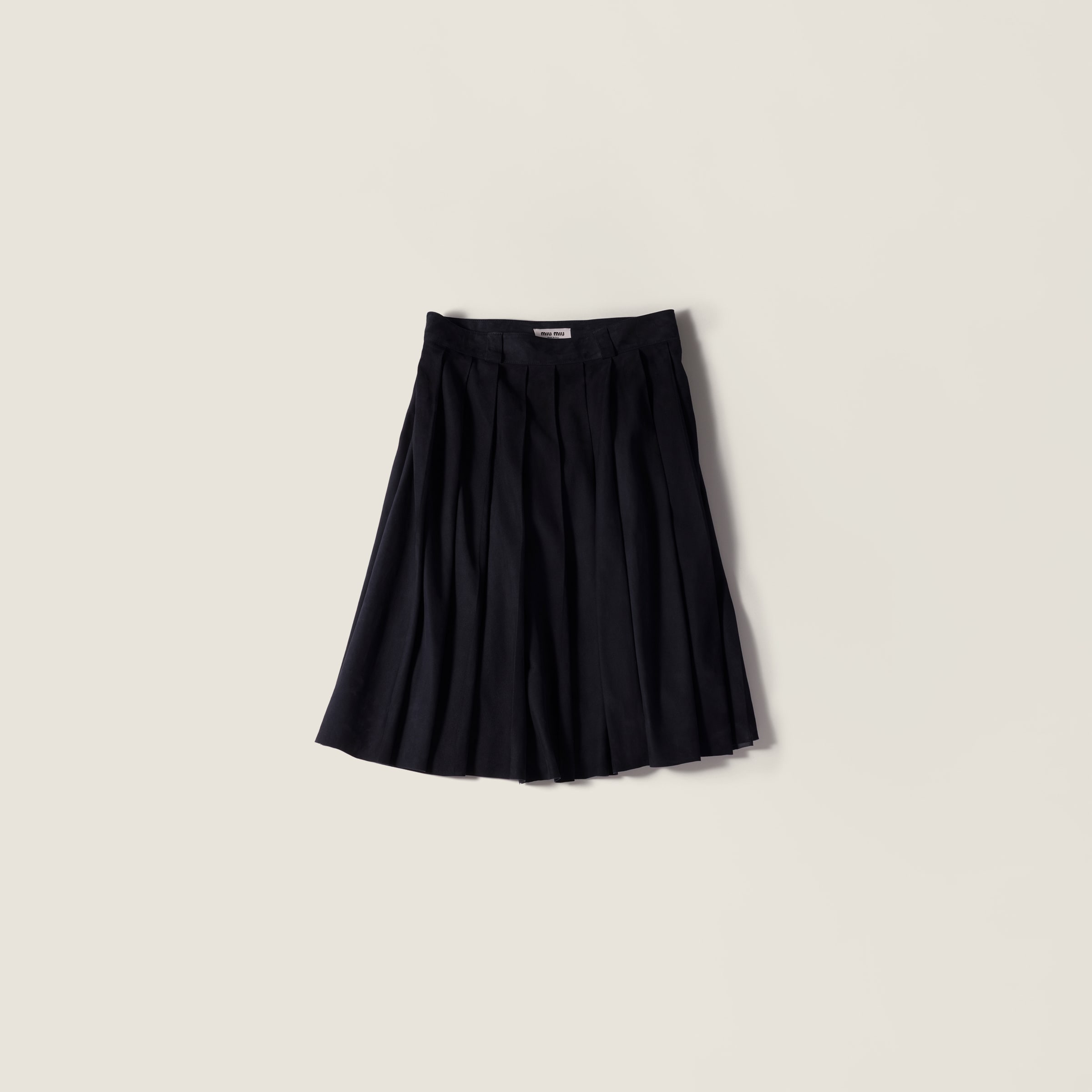 

Плиссированная юбка из вощеной замши MIU MIU, темно-синий