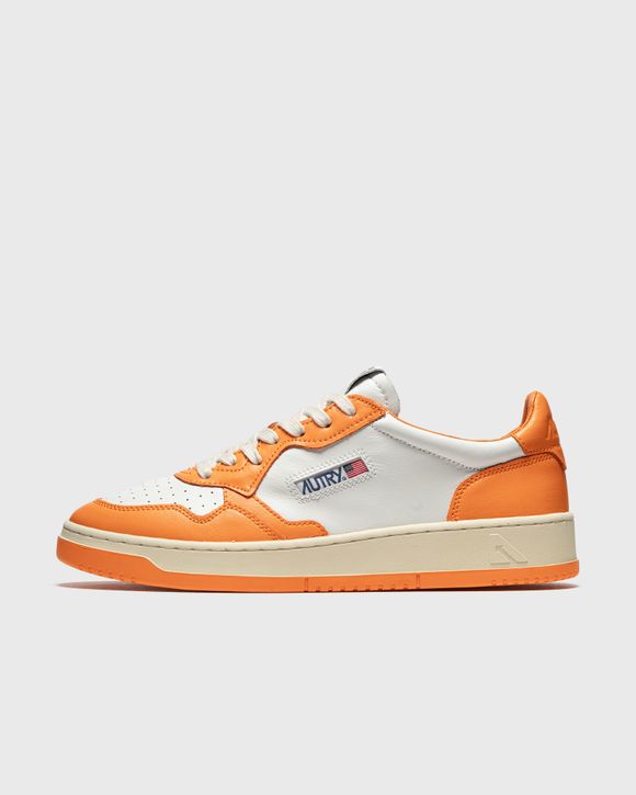 

Кроссовки Autry Action Shoes Medalist Low, цвет leat/leat wht/orange