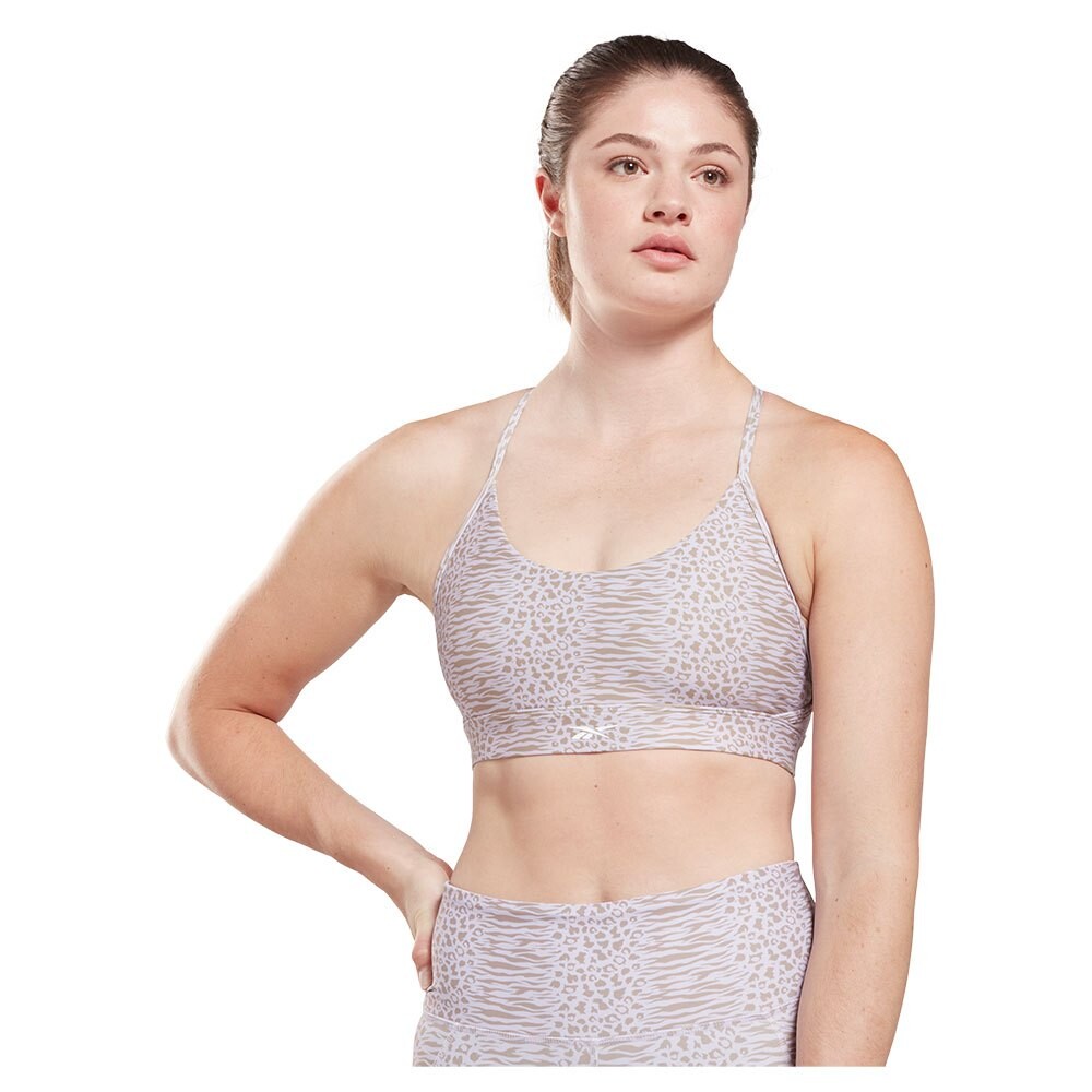 

Спортивный бюстгальтер Reebok Lux Strappy Sports Modern Safari Print, фиолетовый