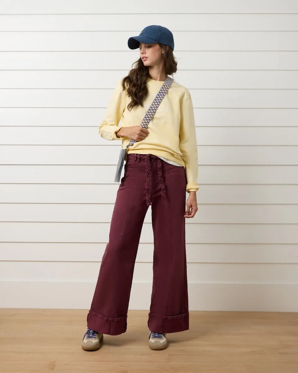 

Женские джинсы с ремнем плетеного бордового цвета Silbon