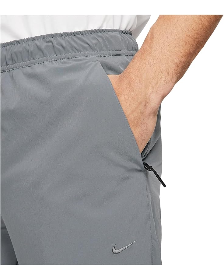 Брюки Nike Dri-FIT Unlimited Tapered Pants, цвет Smoke Grey/Black/Smoke Grey — фото 3