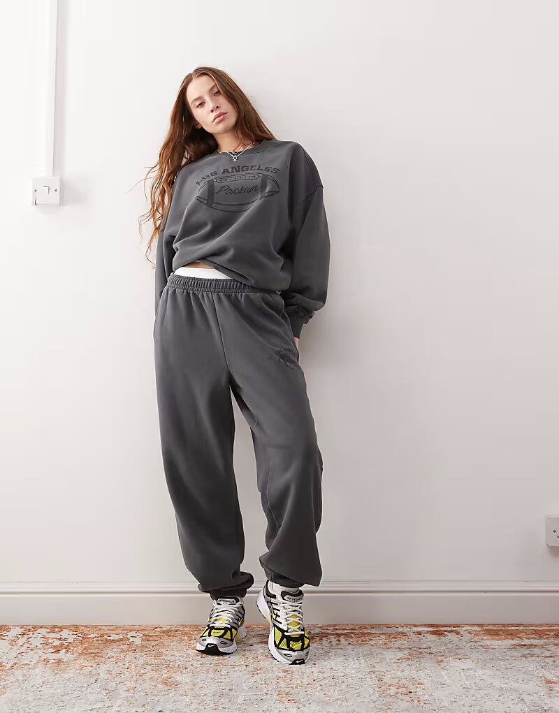 

Спортивные штаны с надписью Pacsun Los Angeles черного цвета - часть комплекта