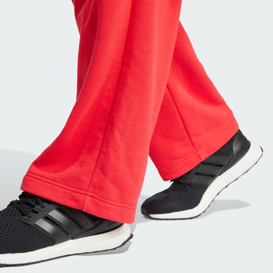 Тренировочные брюки свободного кроя ADIDAS SPORTSWEAR Essentials, красный — фото 4