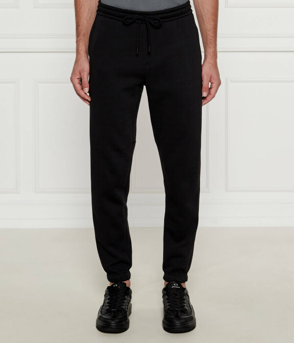 

Спортивные штаны мужские Calvin Klein Jeans зауженные, черный