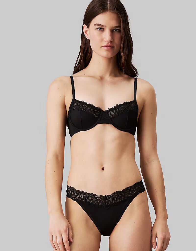 

Бюстгальтер-полуторка на косточках Calvin Klein Attraction черного цвета с кружевной отделкой
