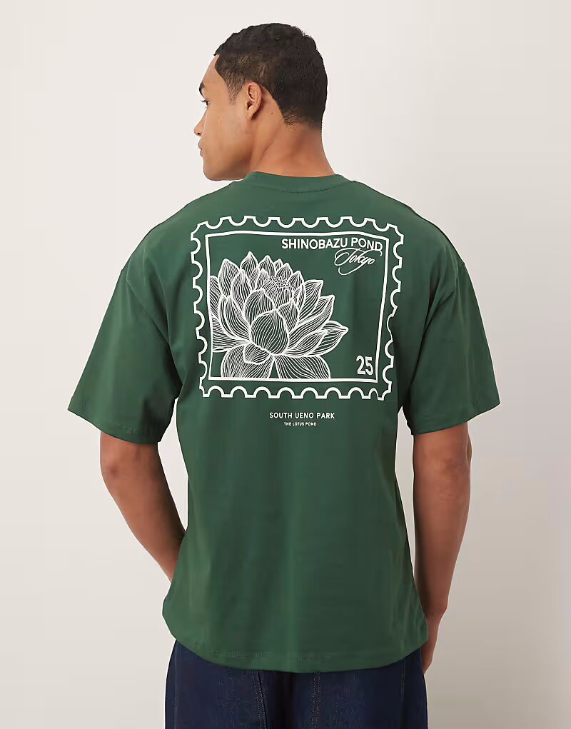 

Выбранная свободная футболка с принтом «Токио» на спине зеленого цвета Selected