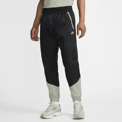 

Брюки Nike Windrunner, цвет Black/Jade Horizon/Jade Horizon