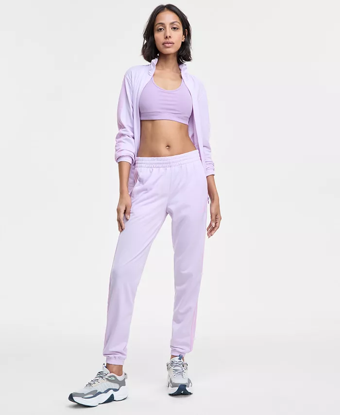 

Женские трикотажные брюки с тремя полосками Track Pants adidas, фиолетовый
