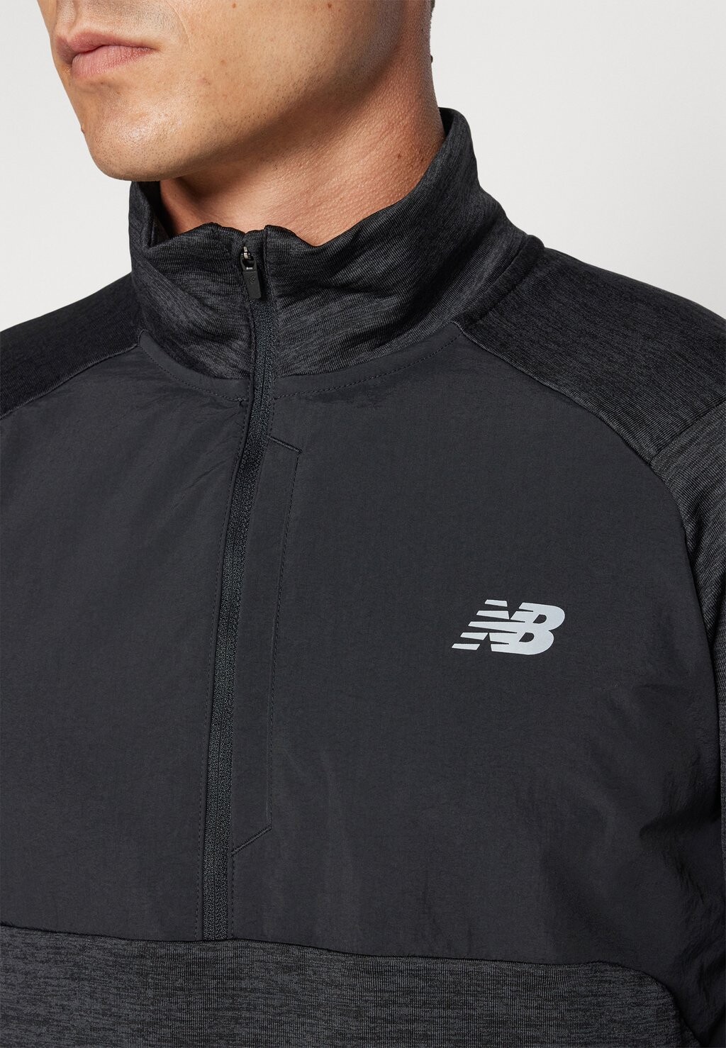 

Топ с длинными рукавами ATHLETICS HEAT GRID ZIP New Balance, черный