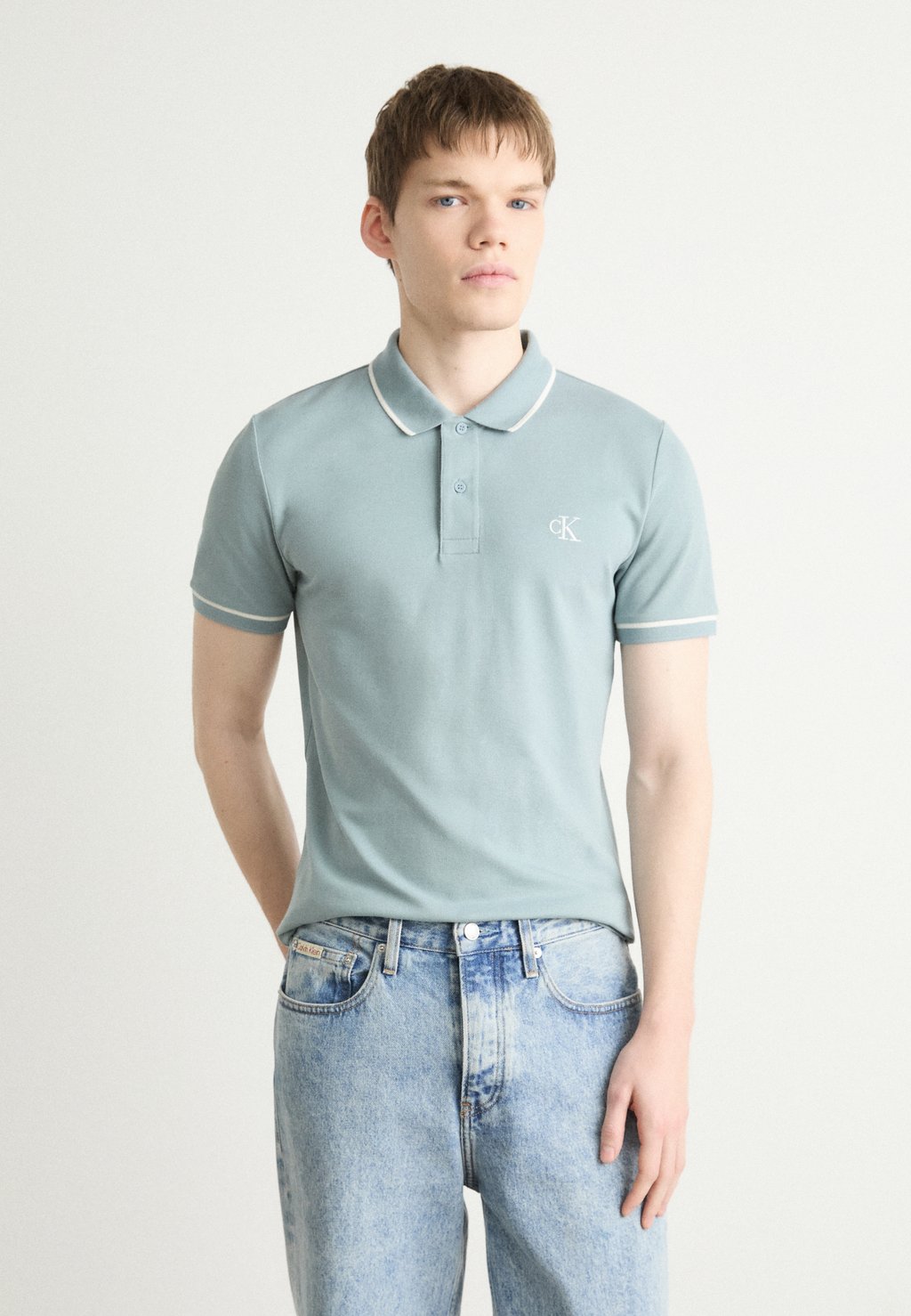 

Поло TIPPING SLIM Calvin Klein Jeans, серый