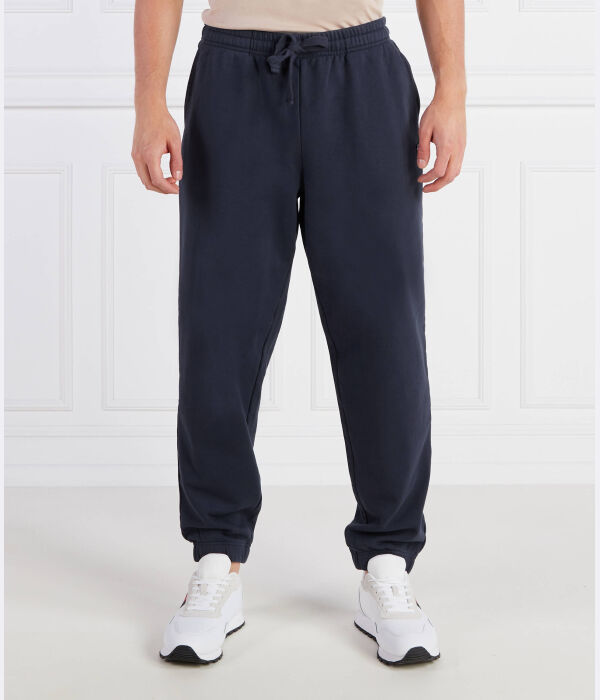 

Спортивные штаны мужские Tommy Jeans свободного кроя на кулиске, синий