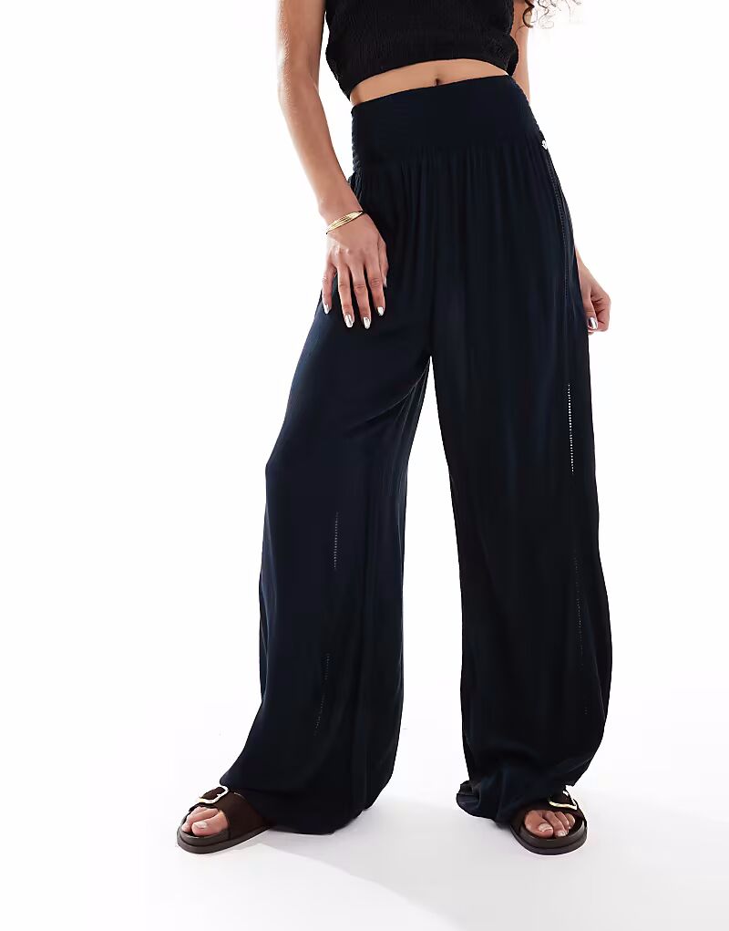 

Брюки Superdry Beach в цвете Eclipse Navy