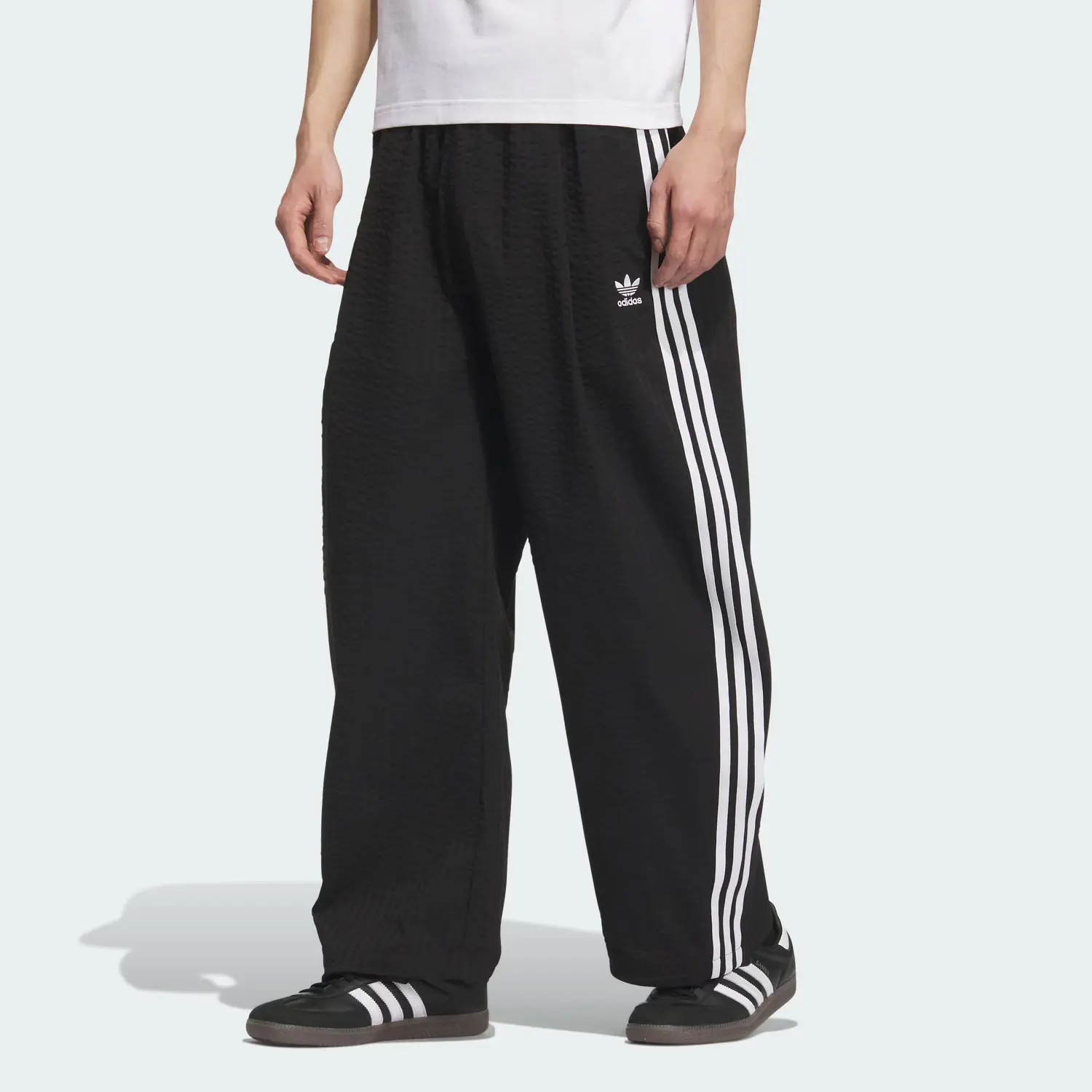 Зауженные спортивные брюки мужские Adidas Originals, черный — фото 2