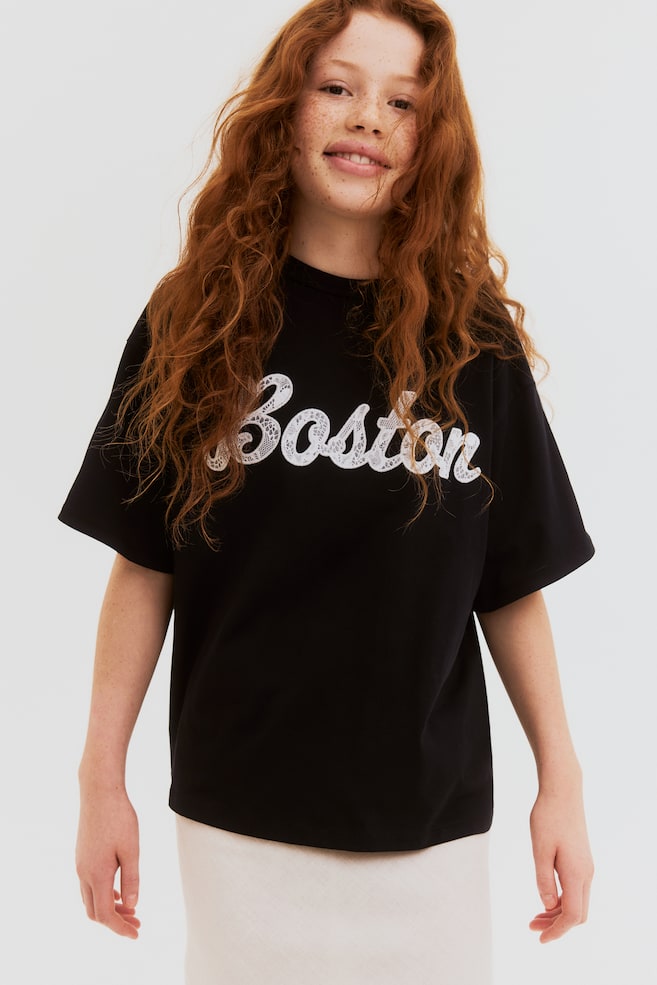 

Футболка с текстовым мотивом H&M, мультиколор