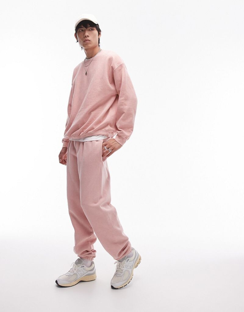 

Светло-розовые джоггеры оверсайз с потертостями Topman