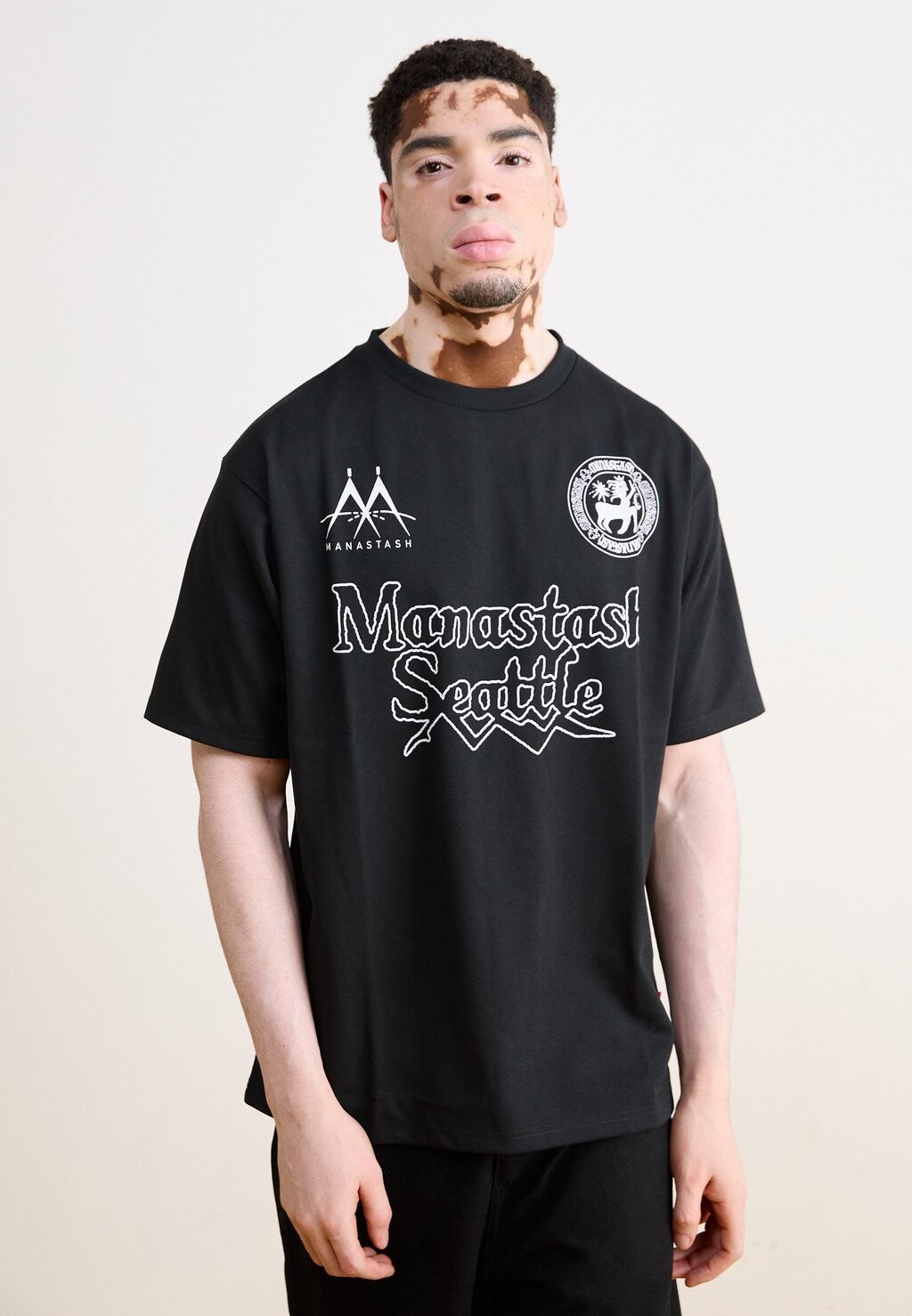 

Футболка с принтом RE:POLY TEE UNIFORM Manastash, черный