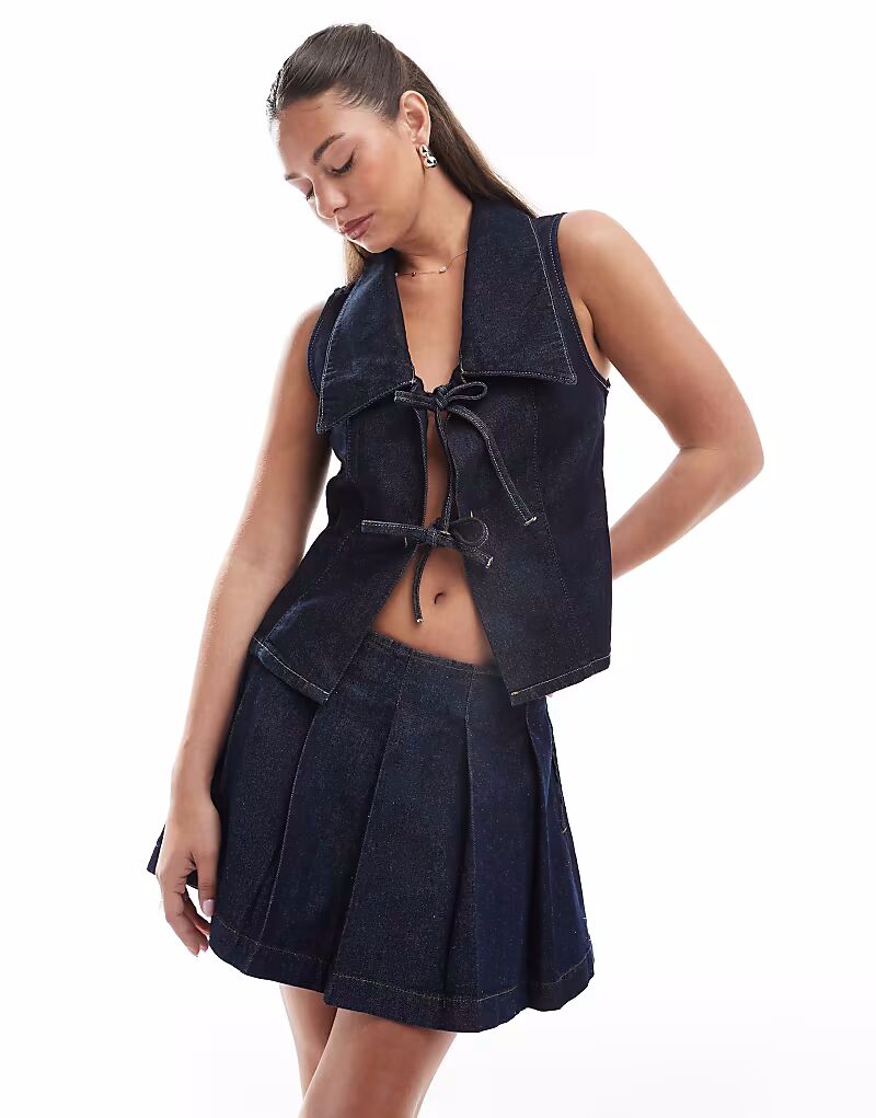 

Мини-юбка из денима в складку ASOS DESIGN цвета индиго