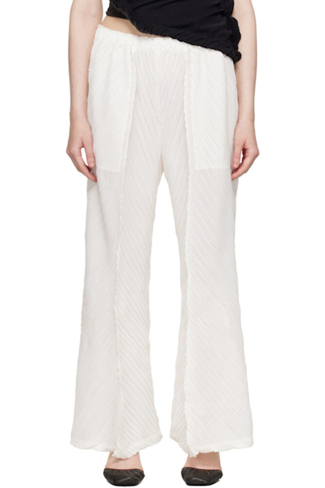 

Белые мятые и перекрученные брюки ISSEY MIYAKE