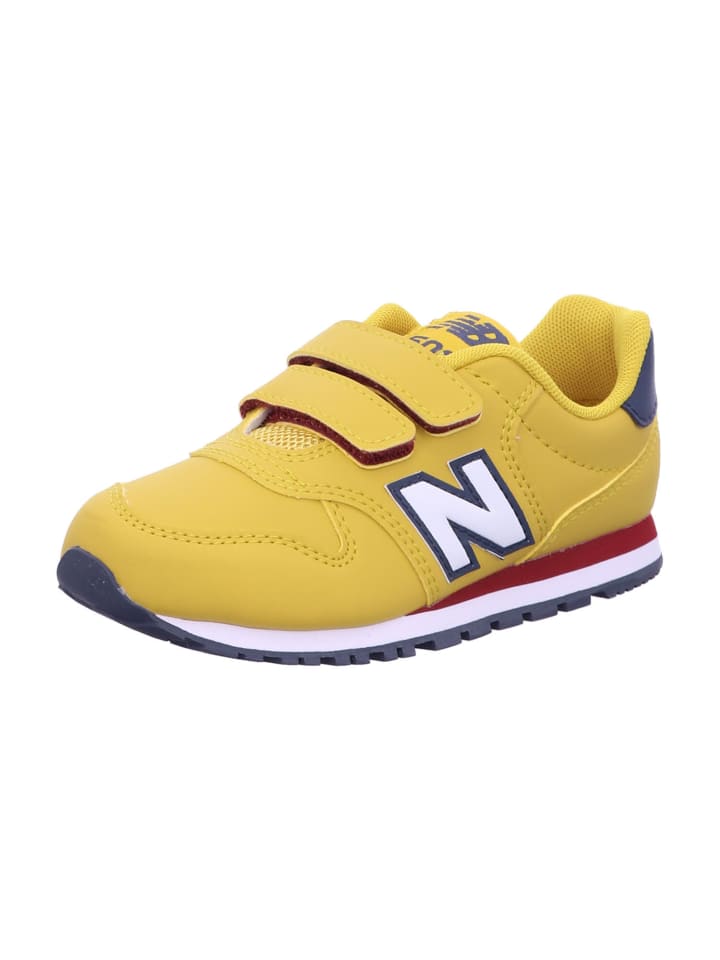 

New Balance Детские кроссовки PV500V1 желтого цвета