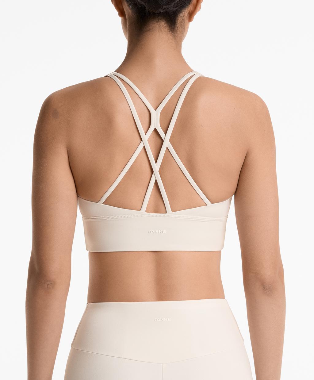 

Спортивный бюстгальтер comfortlux средней поддержки с чашечками Oysho, бледный экрю