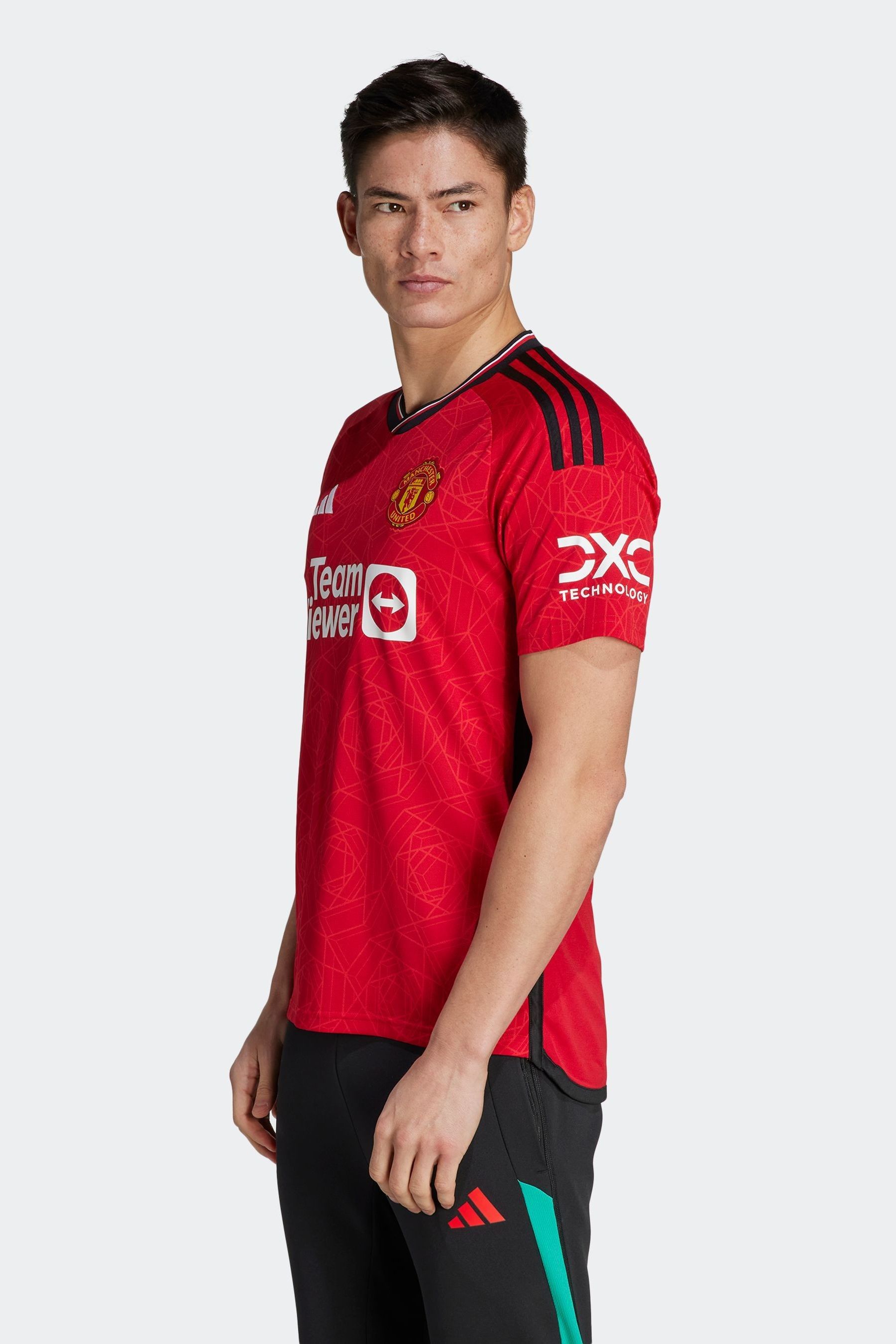 

Домашняя футбольная футболка Manchester United 23/24 adidas, красный