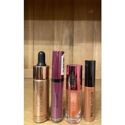 

Масло-хайлайтер для губ Revolution Glaze Крем для губ с розовым золотом 102 Sheer Brilliant 145 Makeup Revolution