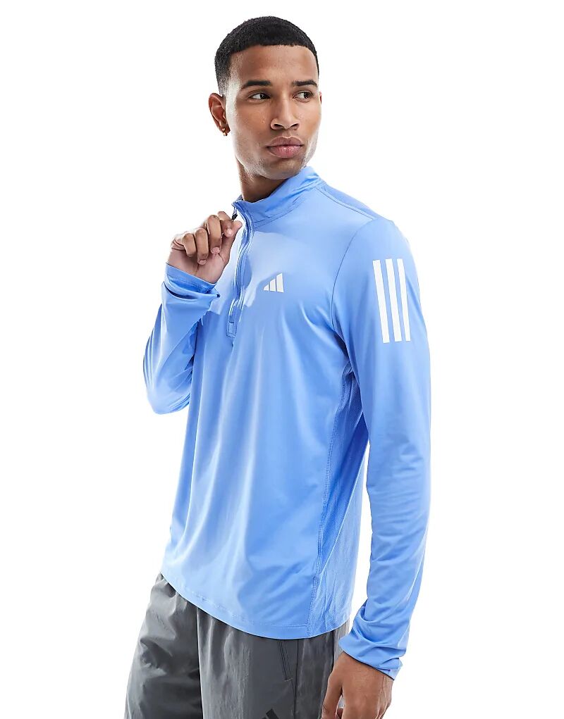 

Свитшот adidas Running Own the run с полумолнией в синем цвете Adidas Performance