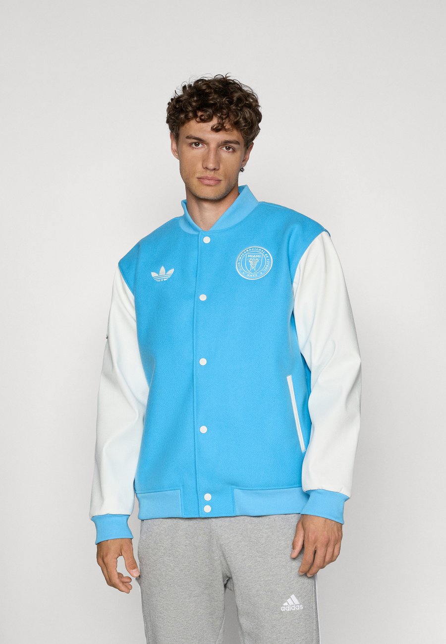 

Куртка Adidas Performance INTER MIAMI CF ORIGINALS VARSITY ANTHEM JACKET, Semi Blue Burst/White Tint/Blue