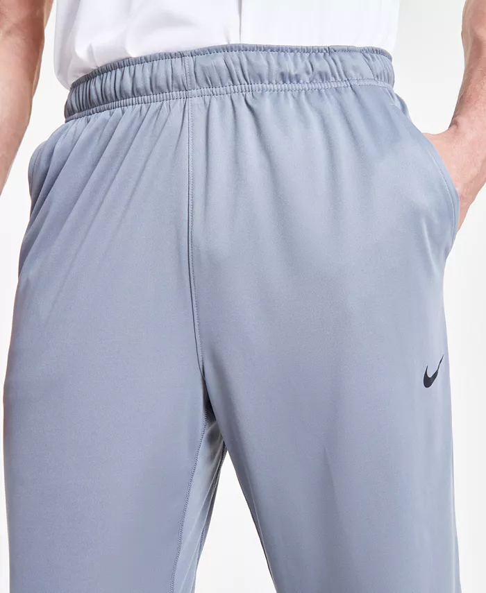 Мужские универсальные брюки Totality Dri-FIT с открытым краем Nike, серый — фото 4