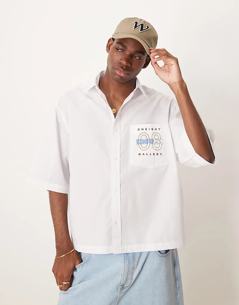 

Рубашка свободного кроя из поплина ASOS DESIGN белого цвета с вышивкой на груди