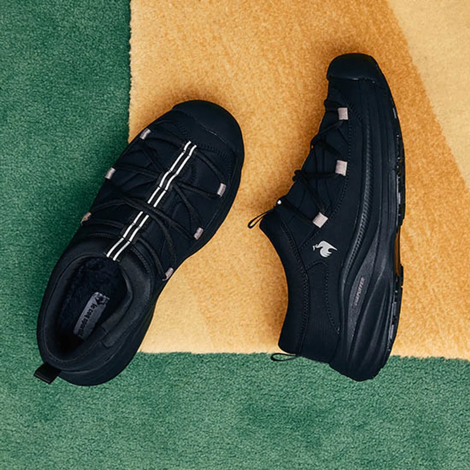 Мужские чёрные утеплённые тапочки Vivapom Puffer от Le Coq Sportif