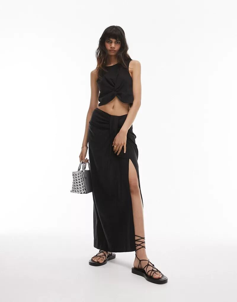 

Черная юбка в тон с узлом Topshop