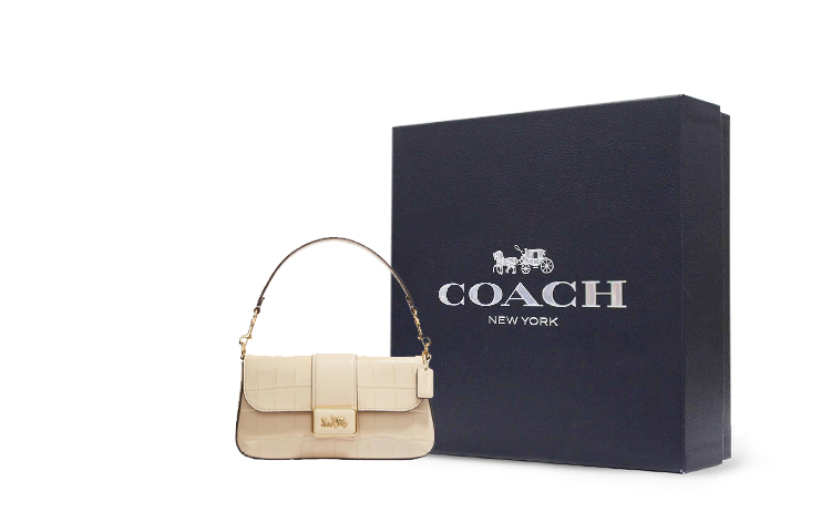 

Сумка через плечо Coach мини из кожи с тиснением под крокодила цвета слоновой кости